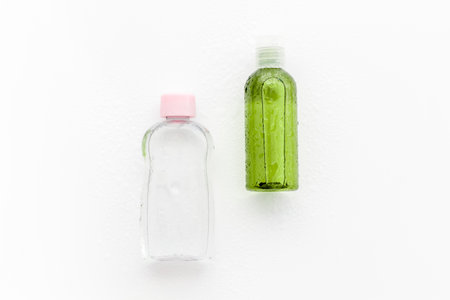 Bottles top view. Products for face cleansing and moisturizing.の写真素材