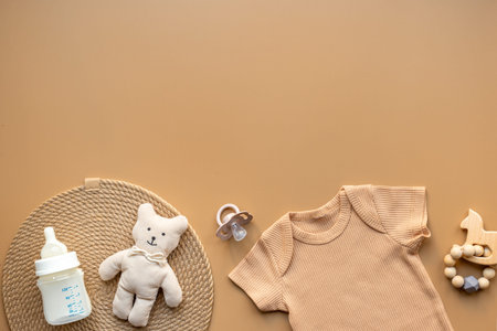 Cotton baby cloth and linen teddy bear toy. Eco friendly newborn accessories, top view.