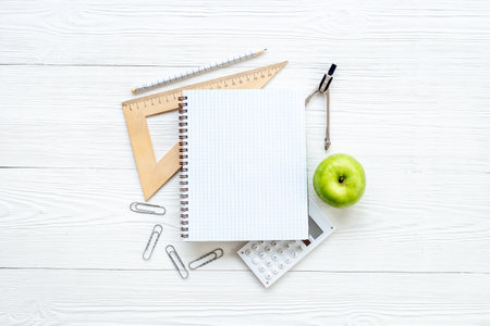 Blank sheet of notebook with supplies. Education concept.