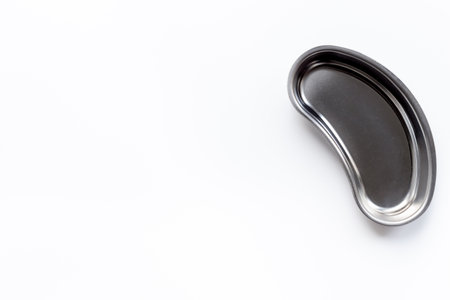 Dental steel bowl on white background, top view. Dentist desk.の写真素材