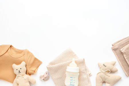 Flat lay with eco friendly baby cloth and accessories. Sustainable lifestyle, zero waste background.の写真素材