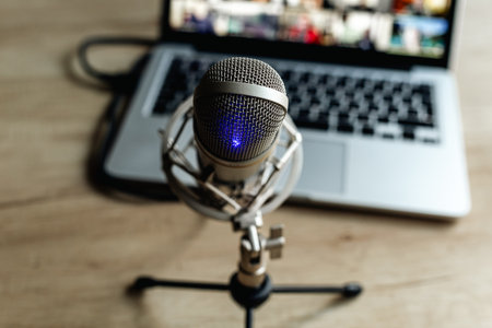 Laptop computer with microphone on the air for video conference calling.