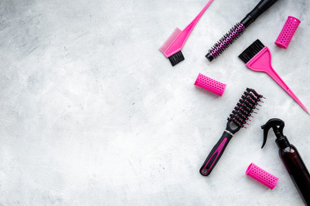 Hairdresser accessories and tools - combs and scissors, top view.