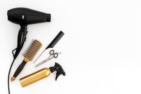 Set of combs, scissors and hair dryer, hairdresser tools set, top view.の写真素材