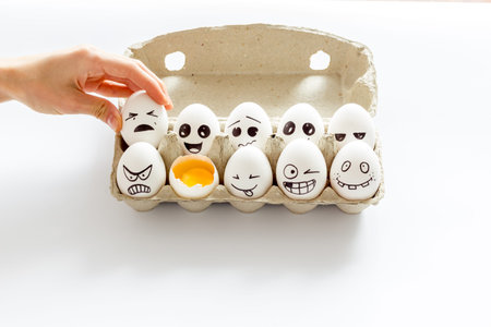 Mental health concept with egg characters. Facial expressions of human emotions.