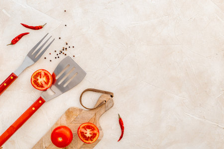 Picnic concept. Barbecue utensils and equipment with cutting board, top view.の写真素材