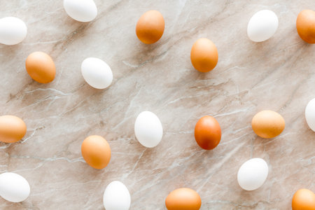 Background of chicken eggs, top view. Food pattern. Easter background.の写真素材