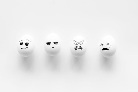 Eggs with facial expressions of human emotions. Communication and comments on social networks.