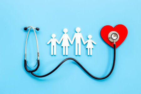 Family wooden figure with parents and children and medical stethoscope. Family medicine, medical and social insurance concept.の写真素材