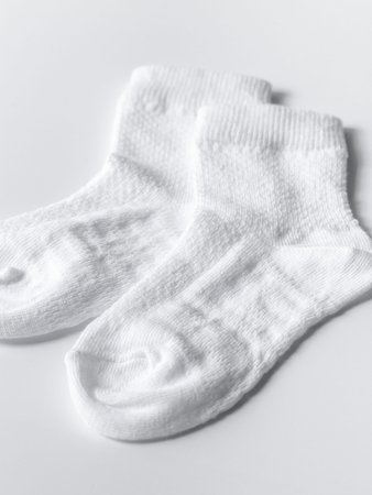 Cotton white socks flat lay. Clothing production, sewing workshop.の写真素材