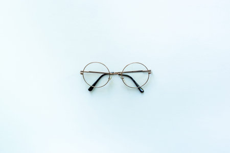 Eye care concept. One glasses with lenses, top view.