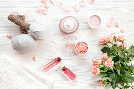 Beauty routine concept - skin care cosmetic with roses essential oil, top viewの写真素材