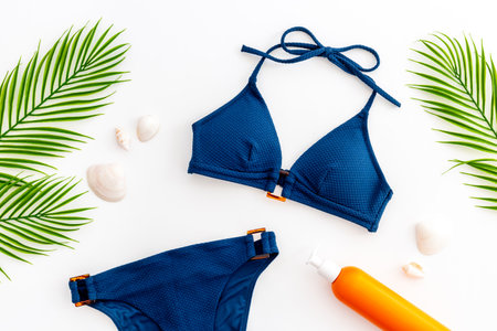Beach female lifestyle clothes and accessories. Flat lay, top view.の写真素材