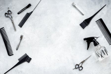 Frame of barber tools. Different kind of combs and scissors, top view.の写真素材