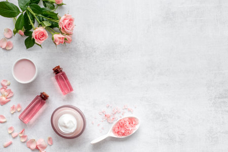 Beauty routine concept - skin care cosmetic with roses essential oil, top viewの写真素材