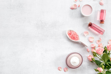 Skin care cosmetic products with roses essential oil. Beauty routine conceptの写真素材