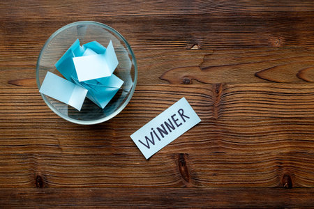 Winner on piece of paper in glass jar, top view. Luck and success concept.の写真素材