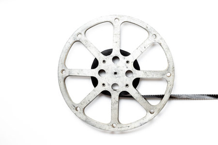Old movie film reel on white background.の写真素材
