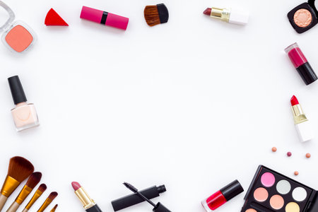 Frame of various makeup tools and cosmetics products, top view.の写真素材