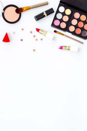 Frame of various makeup tools and cosmetics products, top view.の写真素材