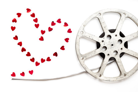 Old movie film reel on white background.の写真素材
