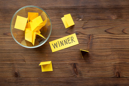 Raffle tickets and winner paper with glass jar. Luck and lottery concept.の写真素材