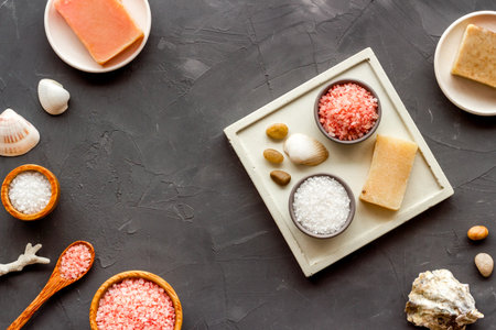 Essential oil and spa cosmetic products with sea shells, top view. Beauty spa therapy cosmetics and wellness background.の写真素材