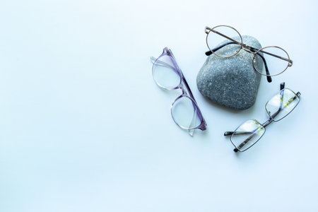Set of stylish glasses, top view. Eye care concept.の写真素材