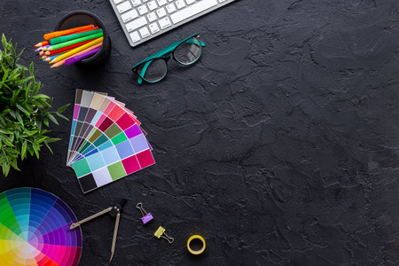 Decorator workspace flat lay. Creative designers table with color paint swatches.の写真素材