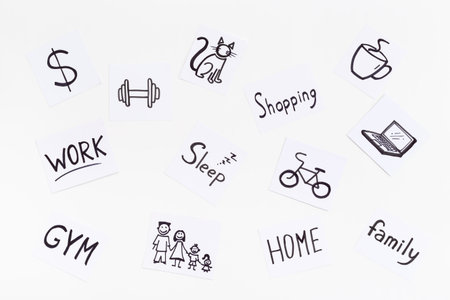Many paper cards with hand drawing of different life activities. Life balance concept.の写真素材