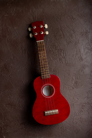 Four string ukulele guitar, musical instrument, cut out isolated on white