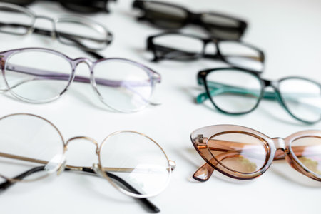 Eye care concept. Group of glasses on white background.