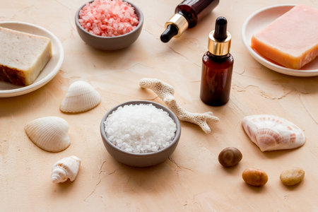 Essential oil in bottles and spa cosmetics, close up. Beauty spa therapy cosmetics and wellness background.の写真素材