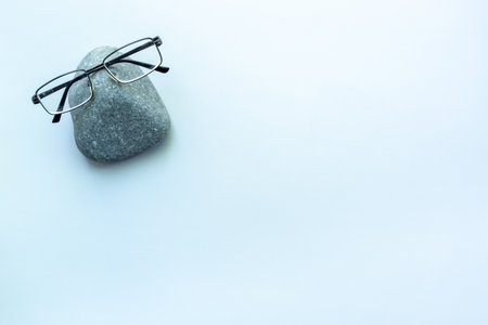 Eye care concept. One pair of glasses with lenses, top view.の写真素材