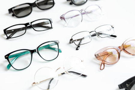 Set with different eyeglasses with lenses isolated on white background.