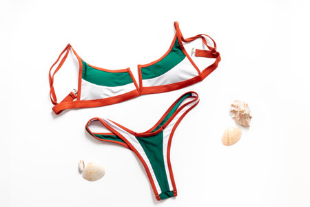 Stylish bikini swimsuit, top view. Beach vacation accessories.の写真素材