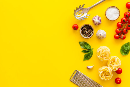 Food ingredients for cooking Italian pasta with tomatoes and basil leaves, top view.の写真素材