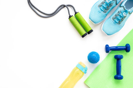 Fitness sports equipment flat lay. Healthy living and wellness concept.の写真素材