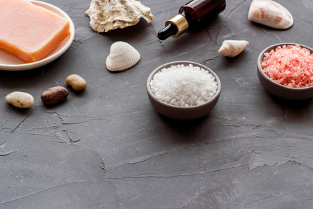 Essential oil in bottles and spa cosmetics, close up. Beauty spa therapy cosmetics and wellness background.の写真素材