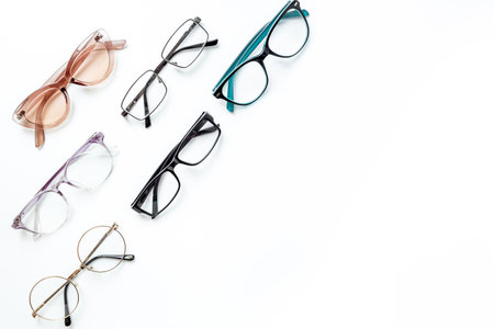 Stylish eyeglasses with lenses on white. Eye care and protection conceptの写真素材