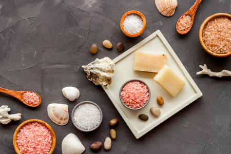 Essential oil and spa cosmetic products with sea shells, top view. Beauty spa therapy cosmetics and wellness background.の写真素材