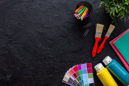Decorator workspace flat lay. Creative designers table with color paint swatches.の写真素材