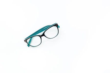 Stylish eyeglasses with lenses on white. Eye care and protection concept