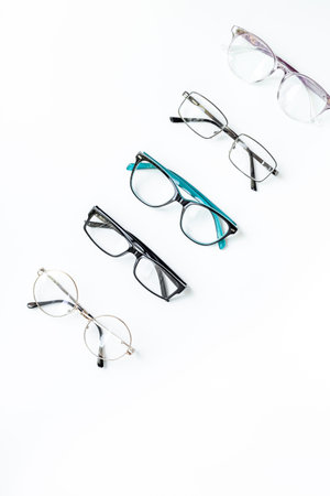 Eye care concept. Group of glasses on white background.