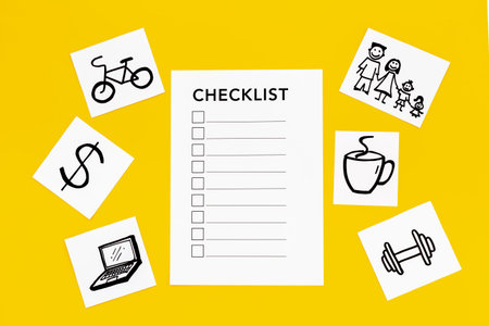 Checklist and many paper cards with hand drawing of different life activities, top view. Life...