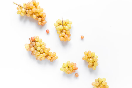 Many fresh grape clusters isolated on white backgroundの写真素材