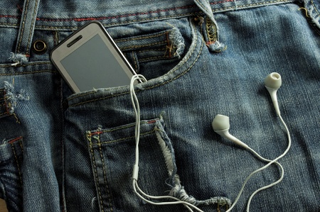  Mobile Phone  in a jeans pocket (includes clipping path for screen) の写真素材