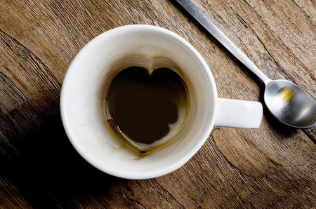 Empty coffee mug, with stains. Overhead viewの写真素材