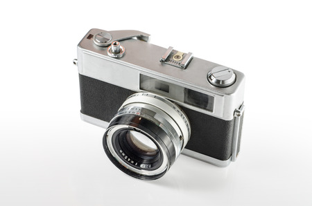Retro photo camera isolated on white の写真素材