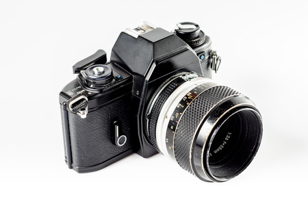 retro camera isolated on whiteの写真素材